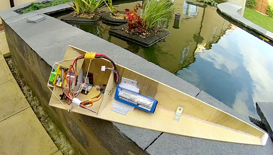 Bixboat on the side of the pond